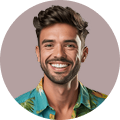 bg-client-review - beachfrontcondopattaya Smiling man with short brown hair and stubble, wearing a teal floral shirt, against a circular pink background in a portrait. -- Alternative: portrait-style photo of a cheerful man in a bright shirt within a pink circle.