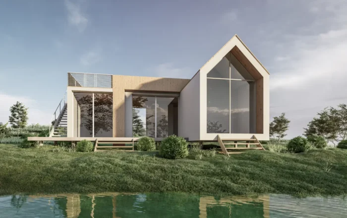 Modern two‑story house with large glass walls and a wooden accent, on a grassy bank by a calm pond.