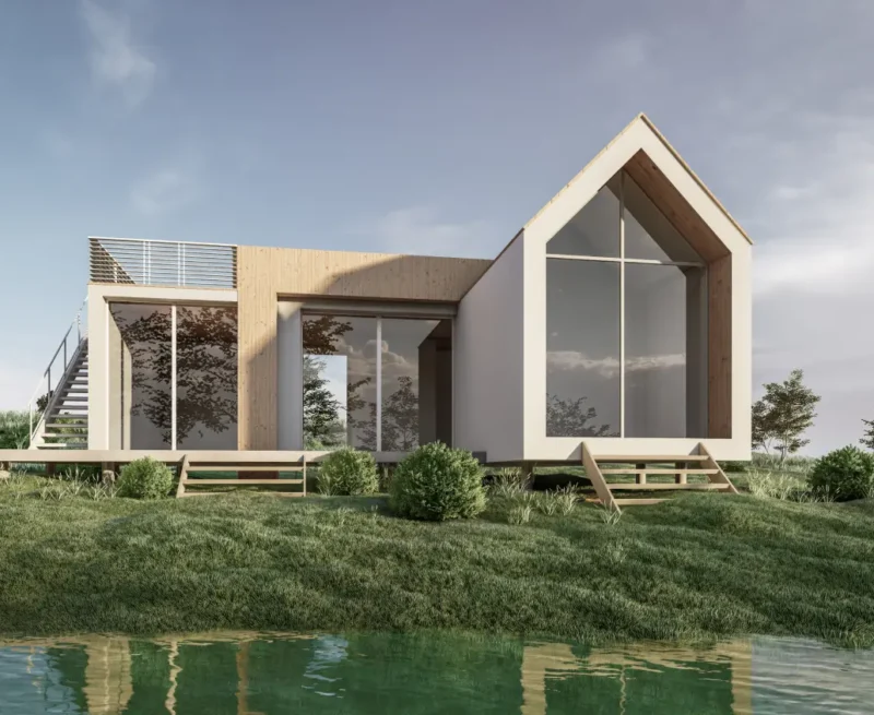 Modern two‑story house with large glass walls and a wooden accent, on a grassy bank by a calm pond.