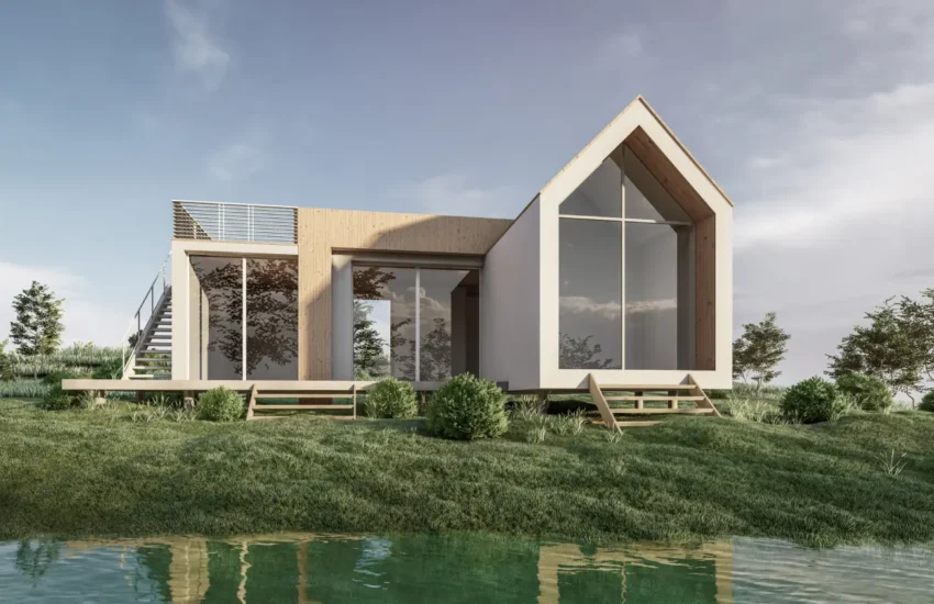 img-folio-3 Modern two‑story house with large glass walls and a wooden accent, on a grassy bank by a calm pond.