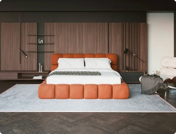 Contemporary bedroom with an orange tufted platform bed, white bedding, and a light blue rug on dark wood floors.