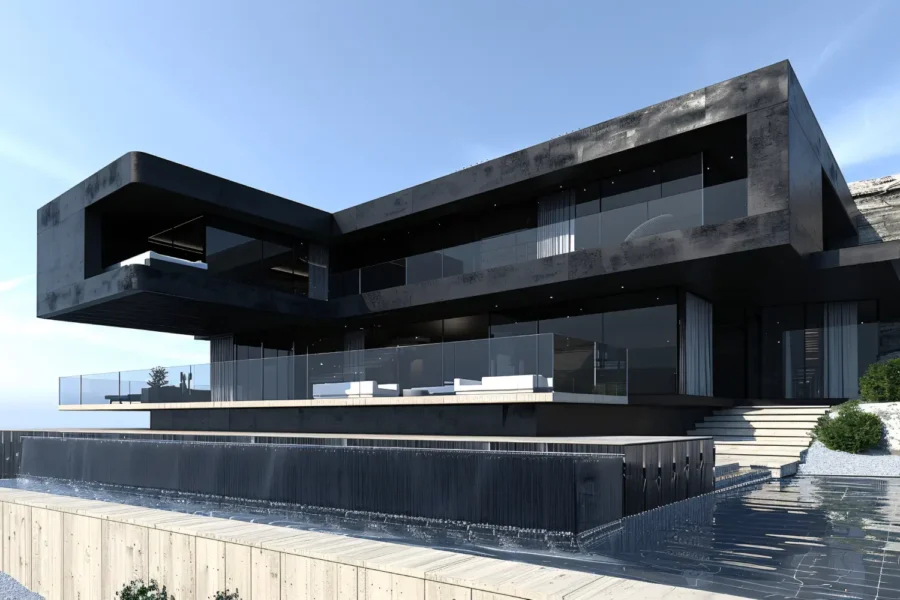 Modern black concrete house with a cantilevered upper level, glass walls, and a reflective water feature in front under a blue sky.